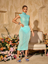 Conjunto Thalvix Verde Menta com Gola Alta e Saia Listrada – Estilo Moderno e Sofisticação em Uma Só Peça