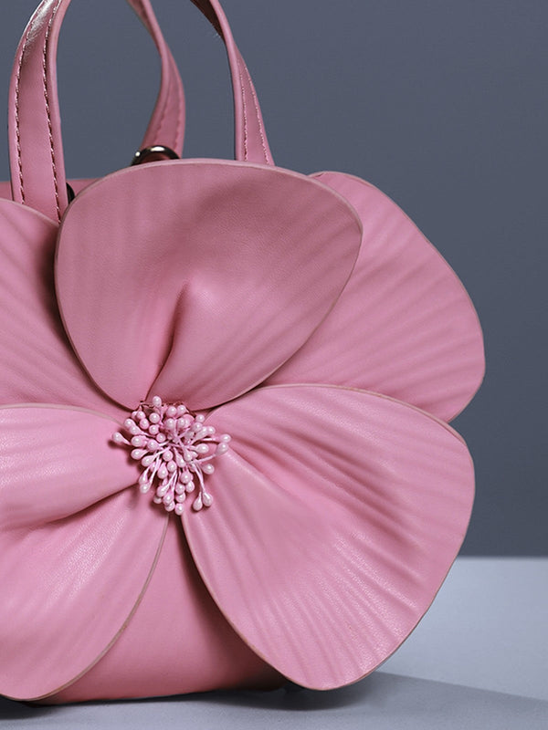 Bolsa Acsah em Couro Rosa com Flor – Arte e Sofisticação em Uma Peça Exclusiva