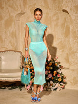 Conjunto Thalvix Verde Menta com Gola Alta e Saia Listrada – Estilo Moderno e Sofisticação em Uma Só Peça